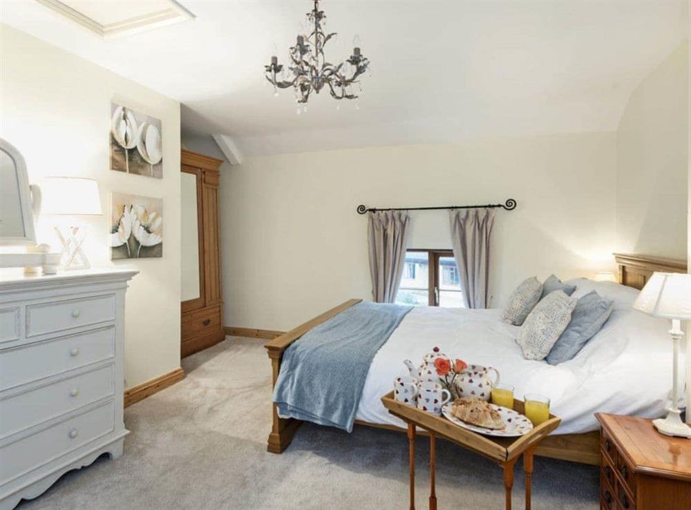 Elegantly decorated double bedroom with kingsize bed at Horseshoes House in Saham Toney, Norfolk
