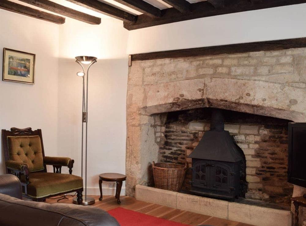 Cosy living room with wood burner (photo 2) at Hound Cottage in Burford, Oxfordshire., Great Britain