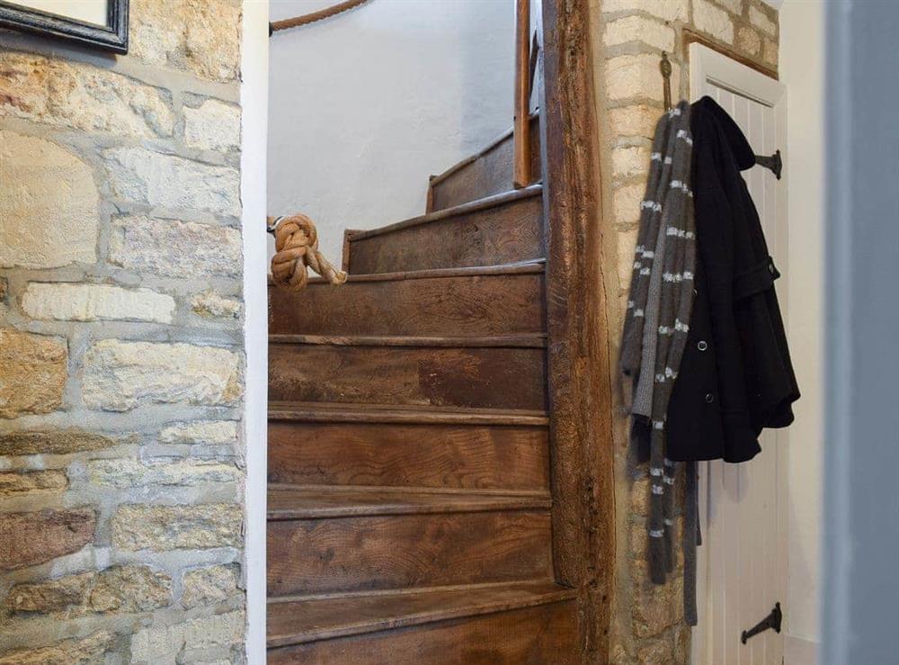 Wooden stairway to first floor at Hound Cottage in Burford, Oxfordshire., Great Britain