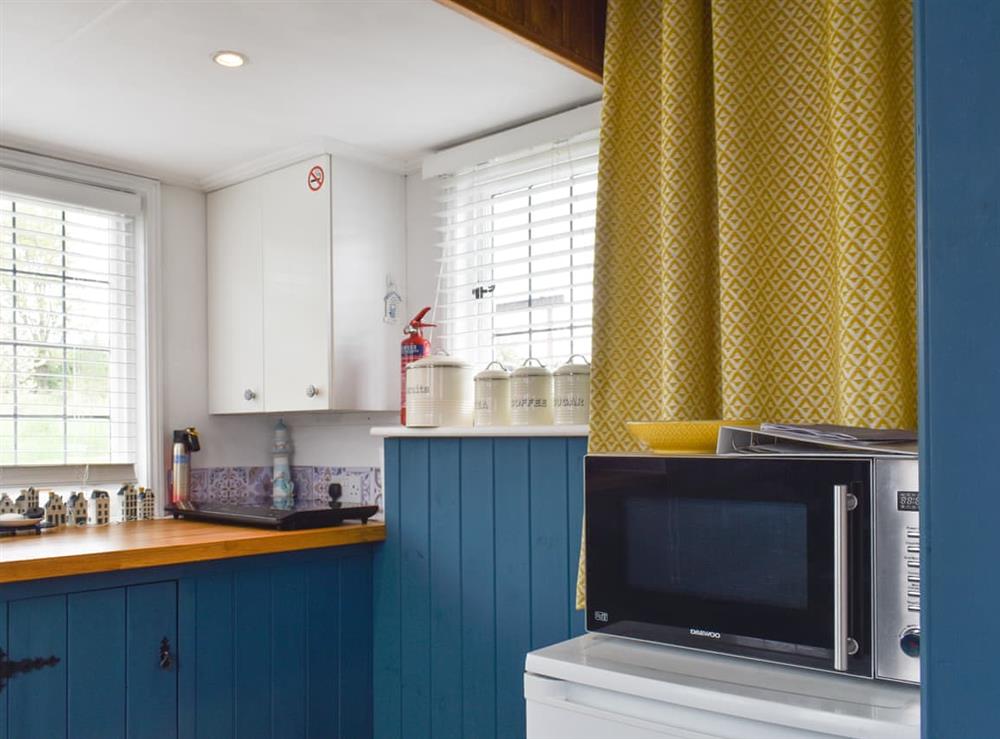 Kitchen area at House Boat in St Osyth, near Clacton-on-Sea, Essex