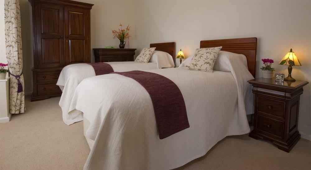 Twin bedroom at House By The Dyke in Chirk, Wrexham