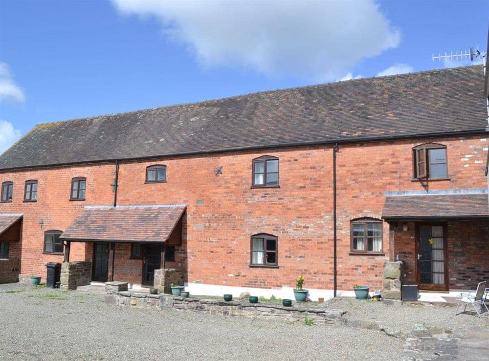 Brick built former agricultural building in a courtyard setting at House in Halford, near Craven Arms, Shropshire