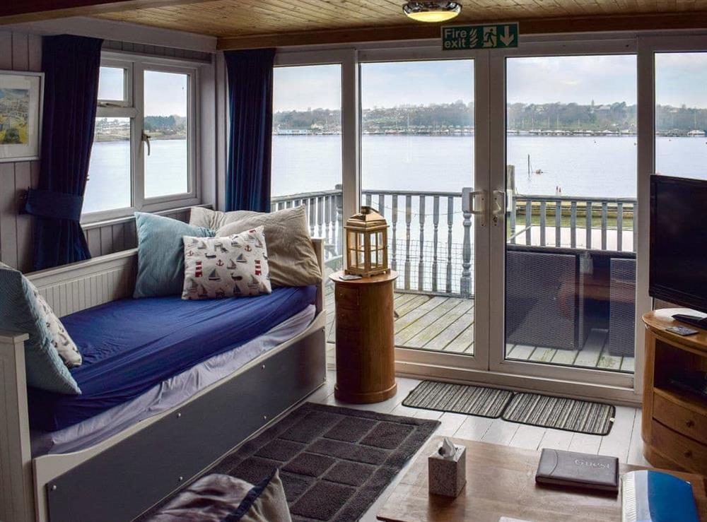 Charming living area with fantastic views at Houseboat Heyvon in Bembridge, near Brading, Isle of Wight