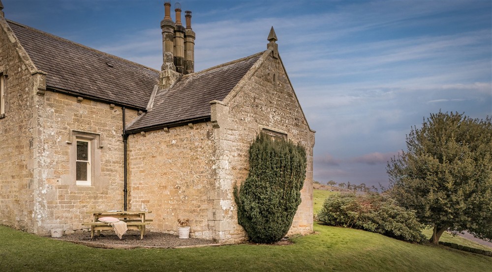 The exterior of Housesteads, its garden and outdoor seating, Northumberland at Housesteads in Hexham, Northumberland