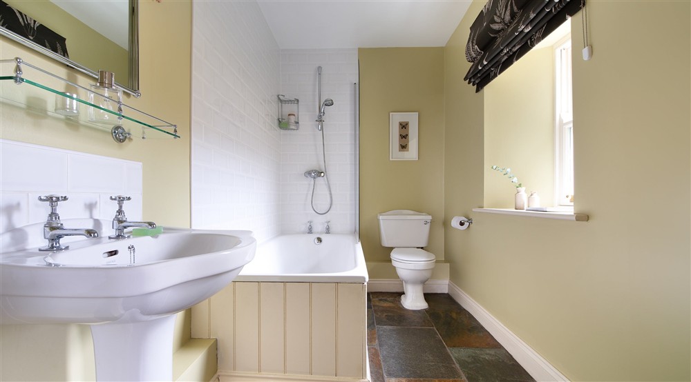The ground-floor bathroom with shower over bath at Housesteads in Hexham, Northumberland