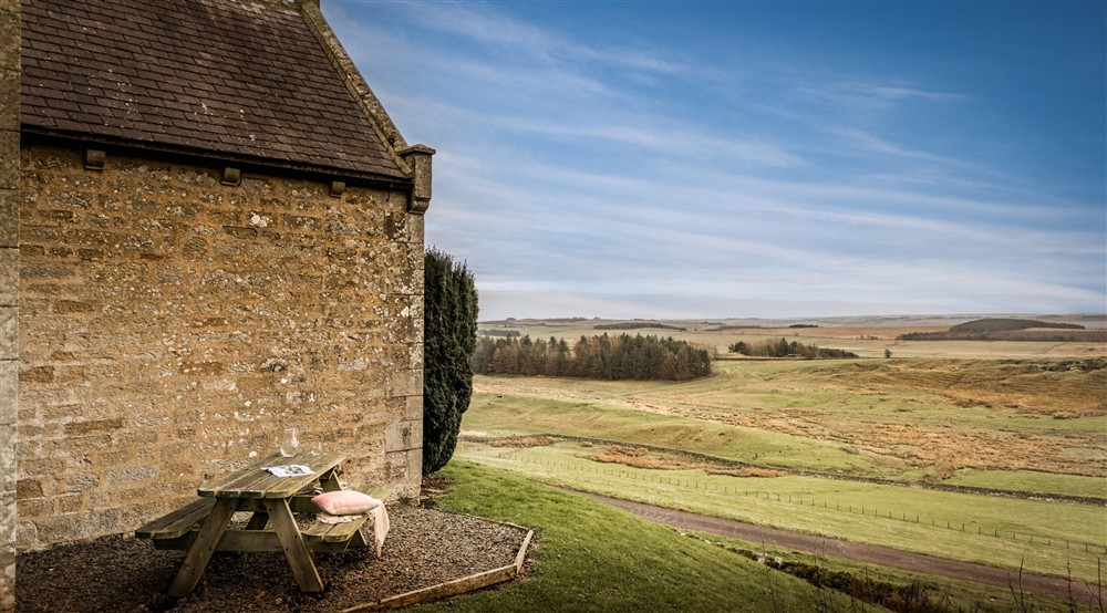 The outdoor seating area and views from the garden at Housesteads in Hexham, Northumberland