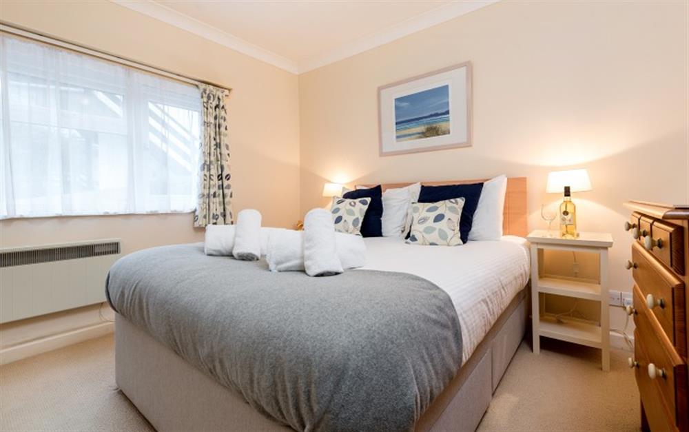 The master bedroom has a king size bed.  at Hove To in Helford Passage