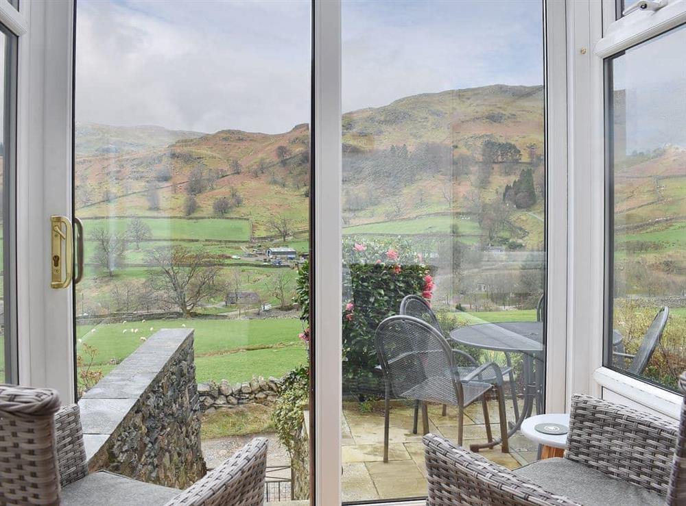 Take in the wonderful view from the conservatory at Hovera in Glenridding, near Penrith, Cumbria