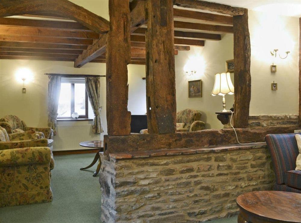 Homely living room with beams (photo 4) at Howards End in Middleton-on-the-Hill, near Leominster, Herefordshire