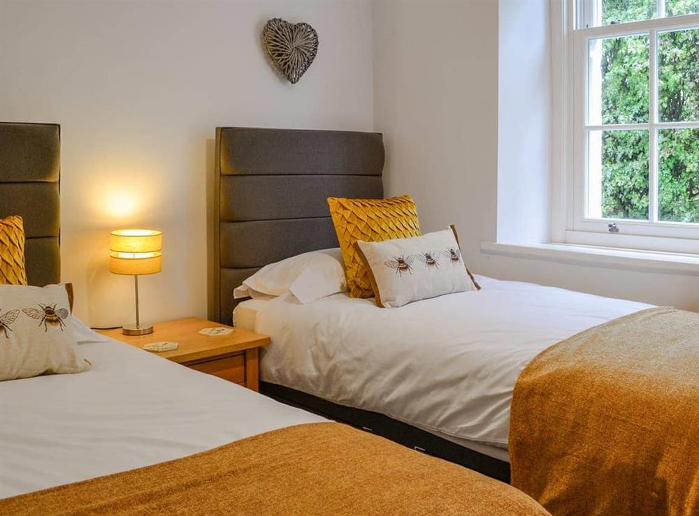 Twin bedroom at Howbeck Cottage in Hesket Newmarket, near Wigton, Cumbria