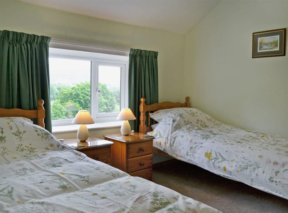 Cosy twin bedroom at Howe Bridge House in near Portinscale, Cumbria