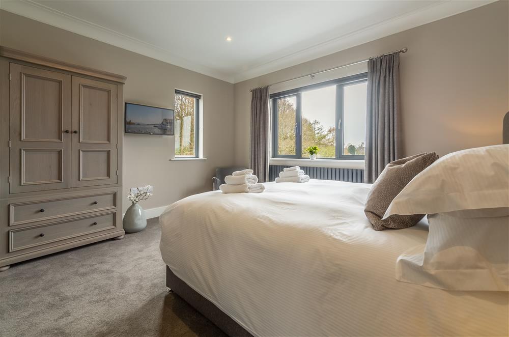 Bedroom four with super-king size zip and link bed at Howe Top, Bowness-On-Windermere