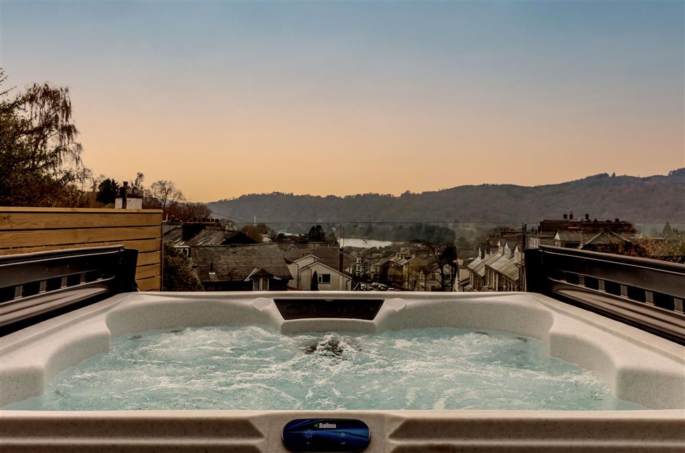 Take in the spectacular view from the balcony with luxurious hot tub at Howe Top, Bowness-On-Windermere