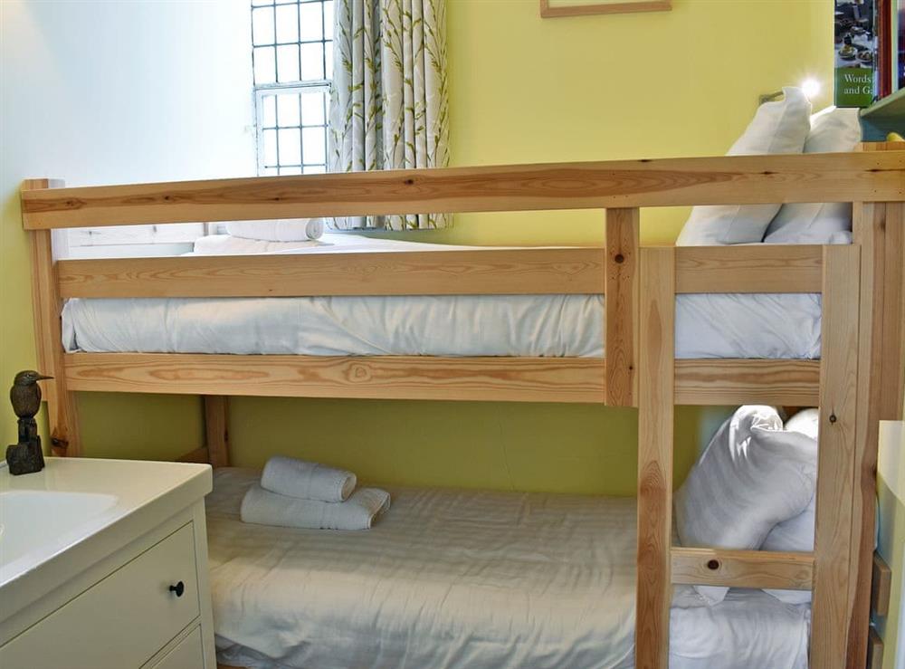 Cosy bunk bedroom at Howegrain Lodge in Pooley Bridge, near Ullswater, Cumbria