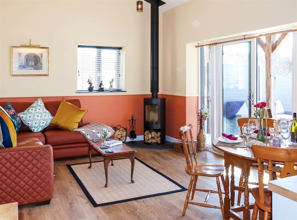 Open plan living space at Humble Bee Cottage in Llanarth, near New Quay, Dyfed
