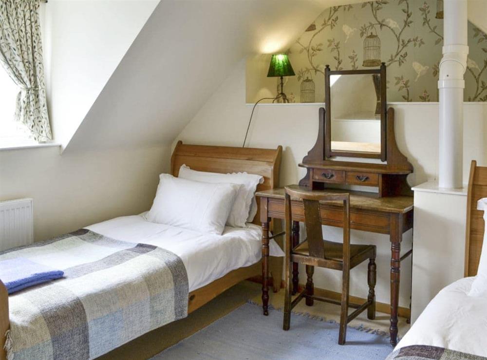 Characterful twin bedroom at Hume Orchard Steading in Hume, near Kelso, Roxburghshire