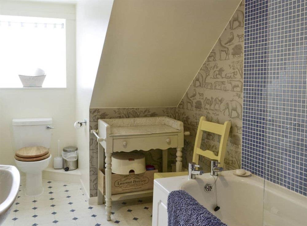Family bathroom with shower over bath at Hume Orchard Steading in Hume, near Kelso, Roxburghshire