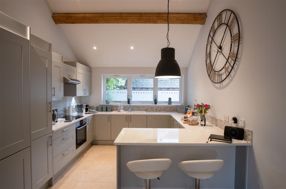 Kitchen with breakfast bar at Hunter Cottage, Clanfield