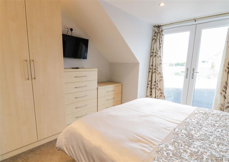 One of the 3 bedrooms (photo 2) at Hunters Cottage, Tyn-y-Gongl near Benllech