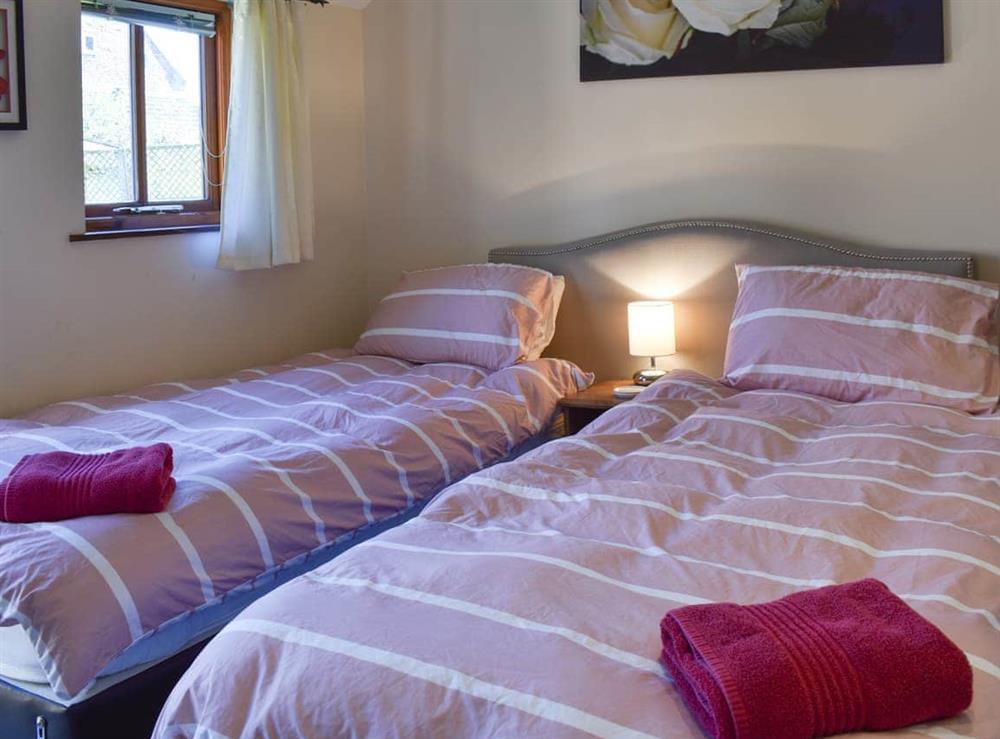 Triple bedroom at Hunters Lodge in Scruton, near Northallerton, North Yorkshire