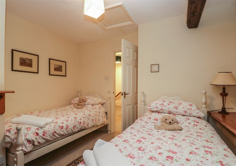 A bedroom in Huntsman's Cottage at Huntsmans Cottage, Cartmel