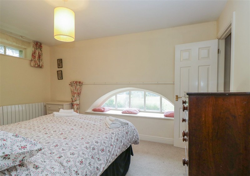 One of the bedrooms at Huntsmans Cottage, Cartmel
