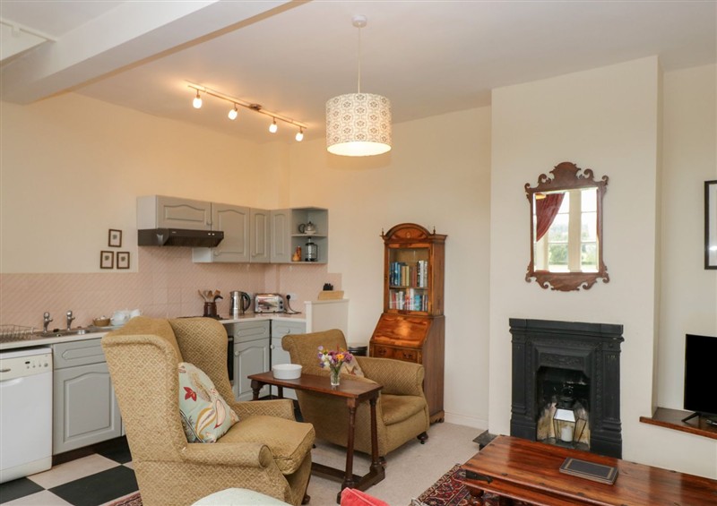 Relax in the living area at Huntsmans Cottage, Cartmel
