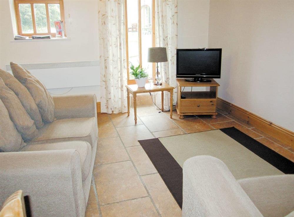 Living room at Hutton Cottage in Muston, Filey, North Yorkshire