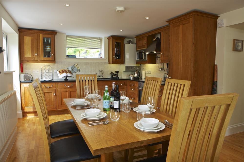 Kitchen with dining area at Hydeaway, 7 Grafton Towers in South Sands, Salcombe