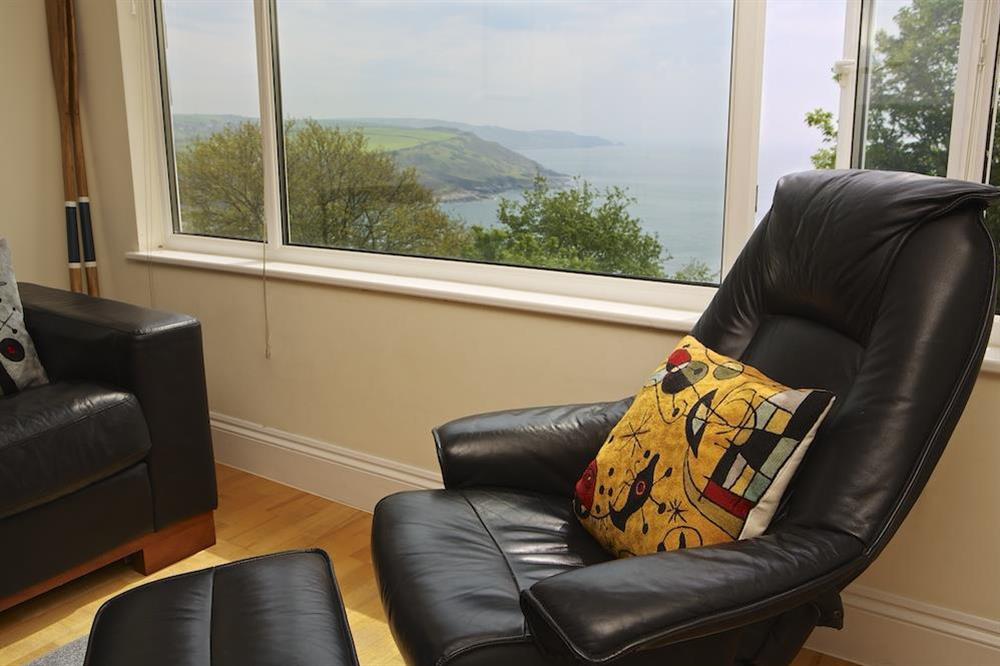 Lounge with large picture window overlooking the 'bar' and mouth of the estuary at Hydeaway, 7 Grafton Towers in South Sands, Salcombe