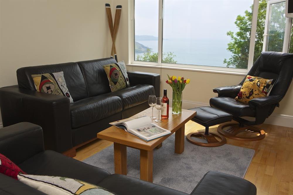 Lounge with leather sofas and wonderful views at Hydeaway, 7 Grafton Towers in South Sands, Salcombe