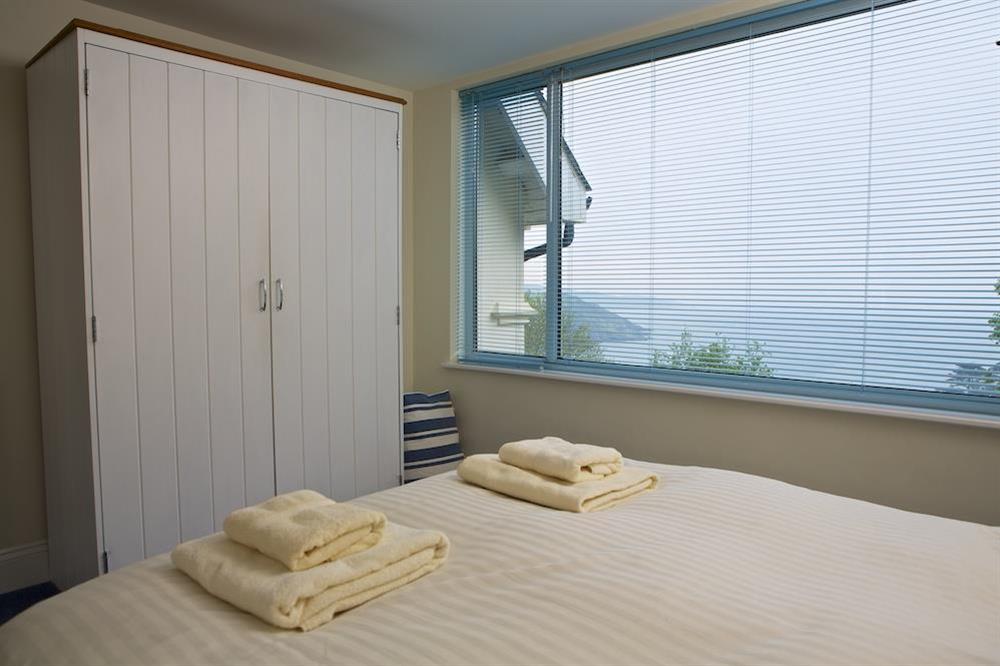 Master bedroom with views over the harbour at Hydeaway, 7 Grafton Towers in South Sands, Salcombe