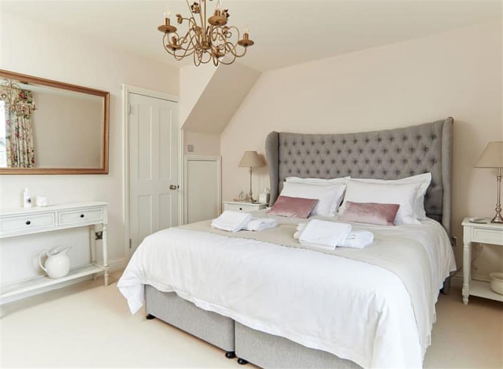 Master bedroom with Super King Hypnos bed at Hydrangea House in Hythe, England
