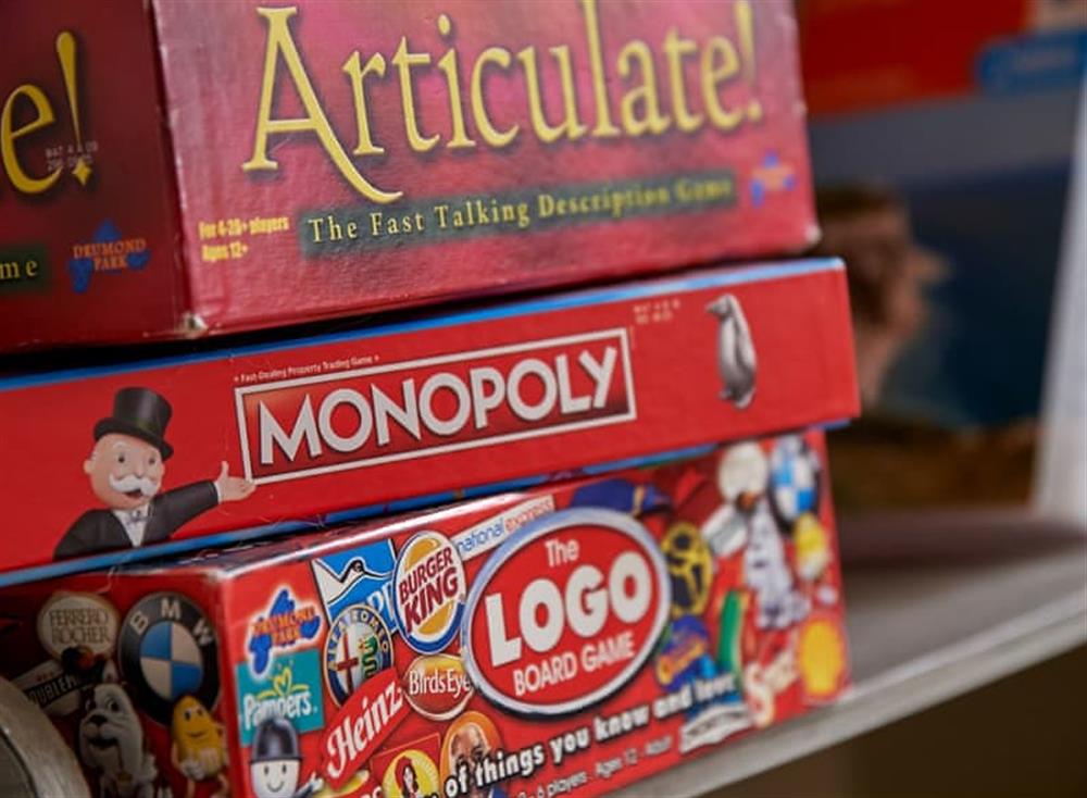 Selection of books and board games provided at Hydrangea House in Hythe, England