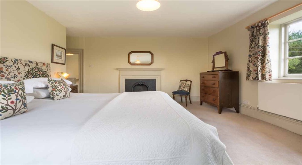 The oppulent master bedroom at Ickworth Keeper's Cottage in Bury St. Edmunds, Suffolk