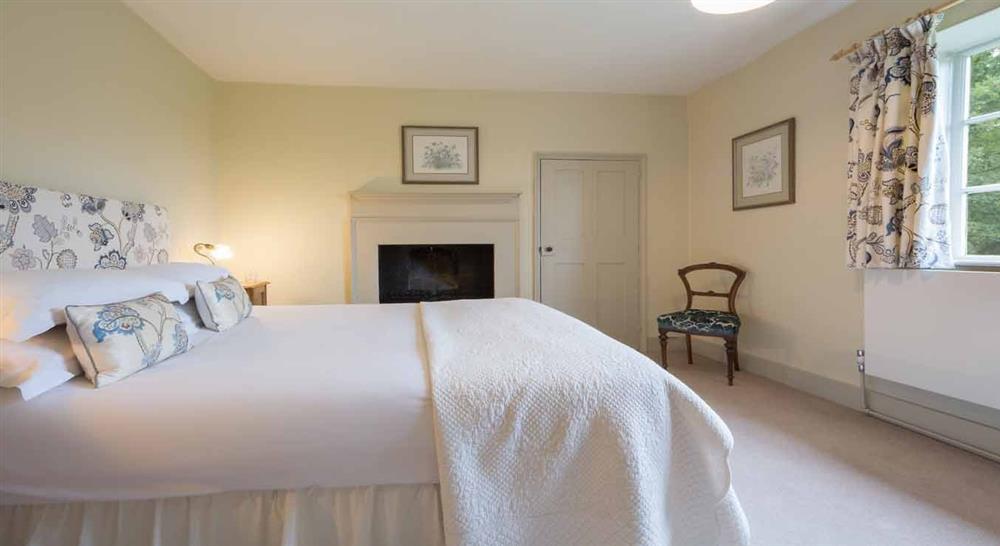 The spacious double bedroom at Ickworth Keeper's Cottage in Bury St. Edmunds, Suffolk