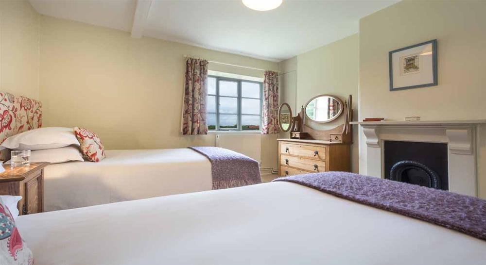 The spacious twin bedroom at Ickworth Keeper's Cottage in Bury St. Edmunds, Suffolk