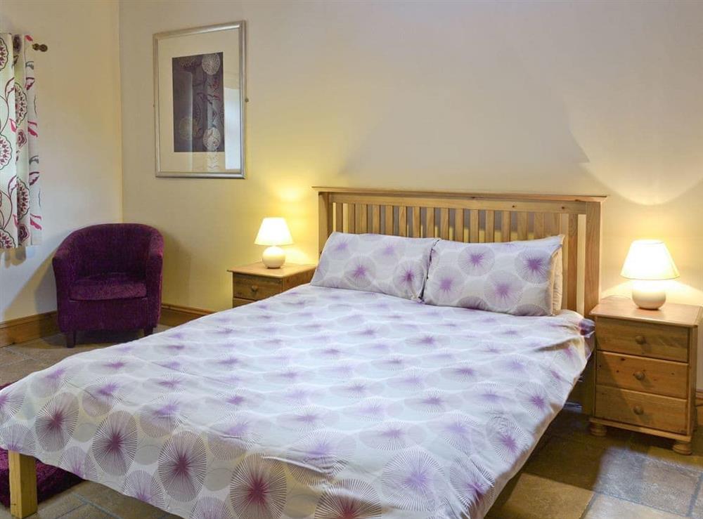 Comfortable double bedroom at Ilingworth Cottage in Muston, Filey, North Yorkshire