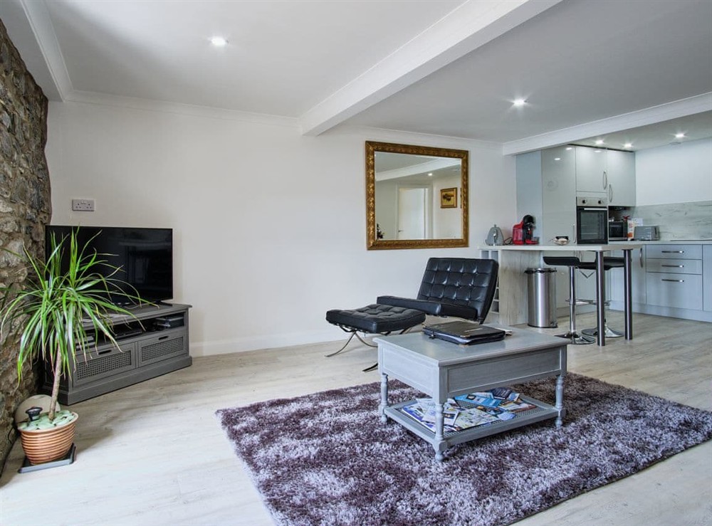 Open plan living space at Imperial Apartment in Oban, Argyll