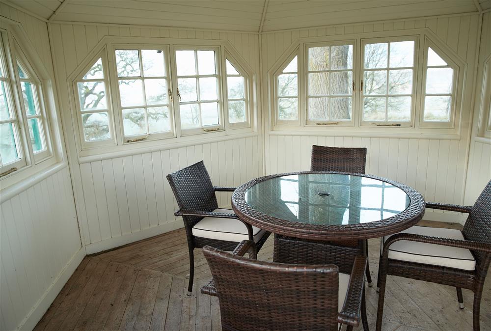 Seating within the summer house  at Independent Apartment, Netherby Hall, Longtown