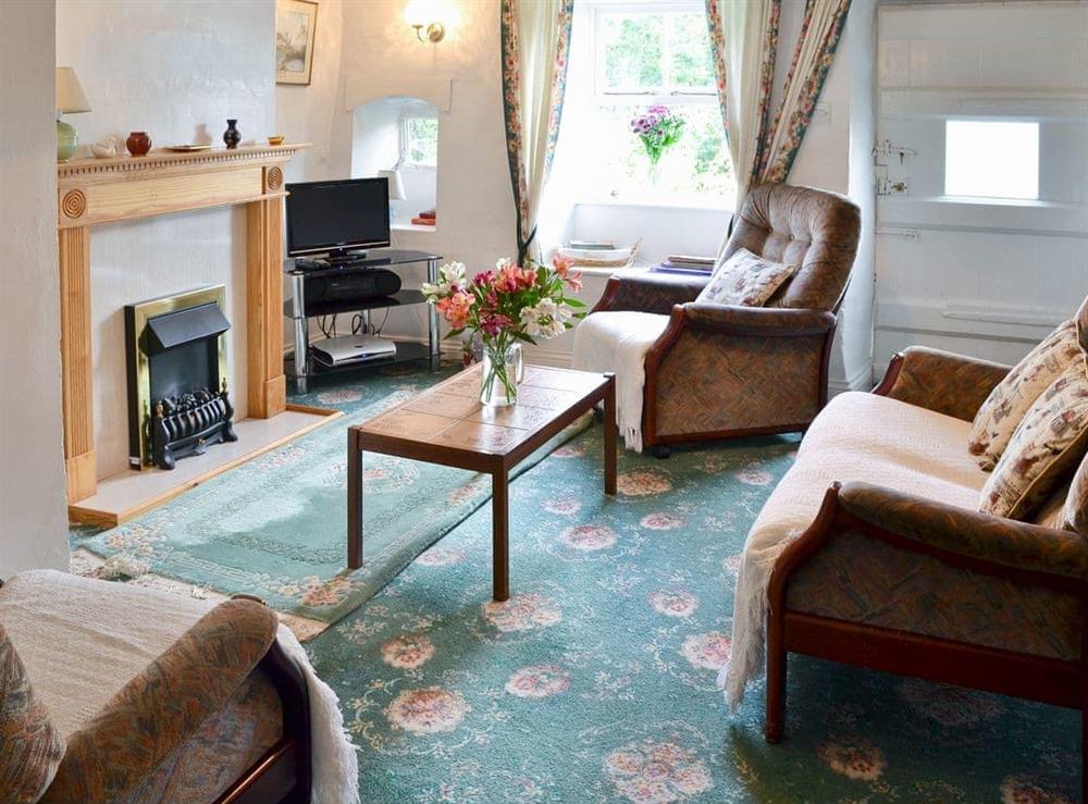 Cosy living room at Ingle Neuk Cottage in Bowscale, near Keswick, Cumbria