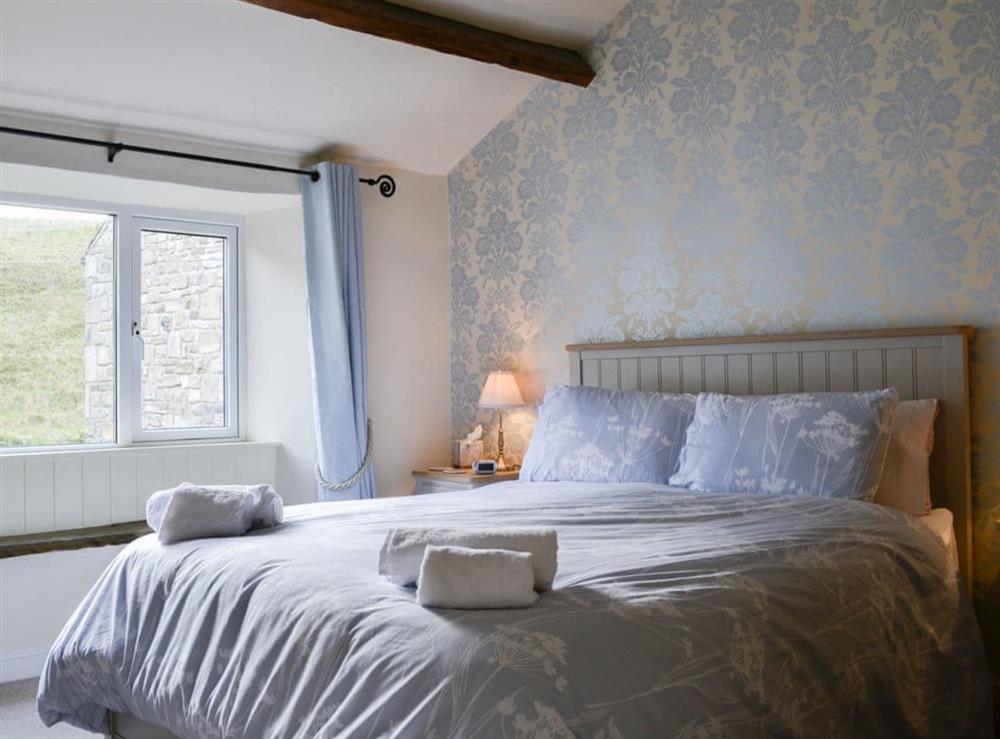 Cosy and comfortable double bedroom at Inglenook Cottage in Linton Falls, near Grassington, North Yorkshire