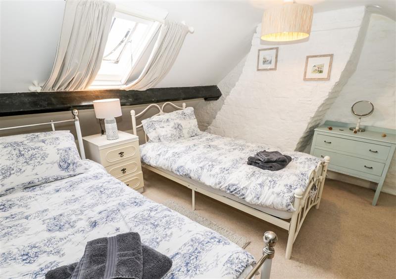 A bedroom in Inglenook Cottage (photo 2) at Inglenook Cottage, North York Moors & Coast