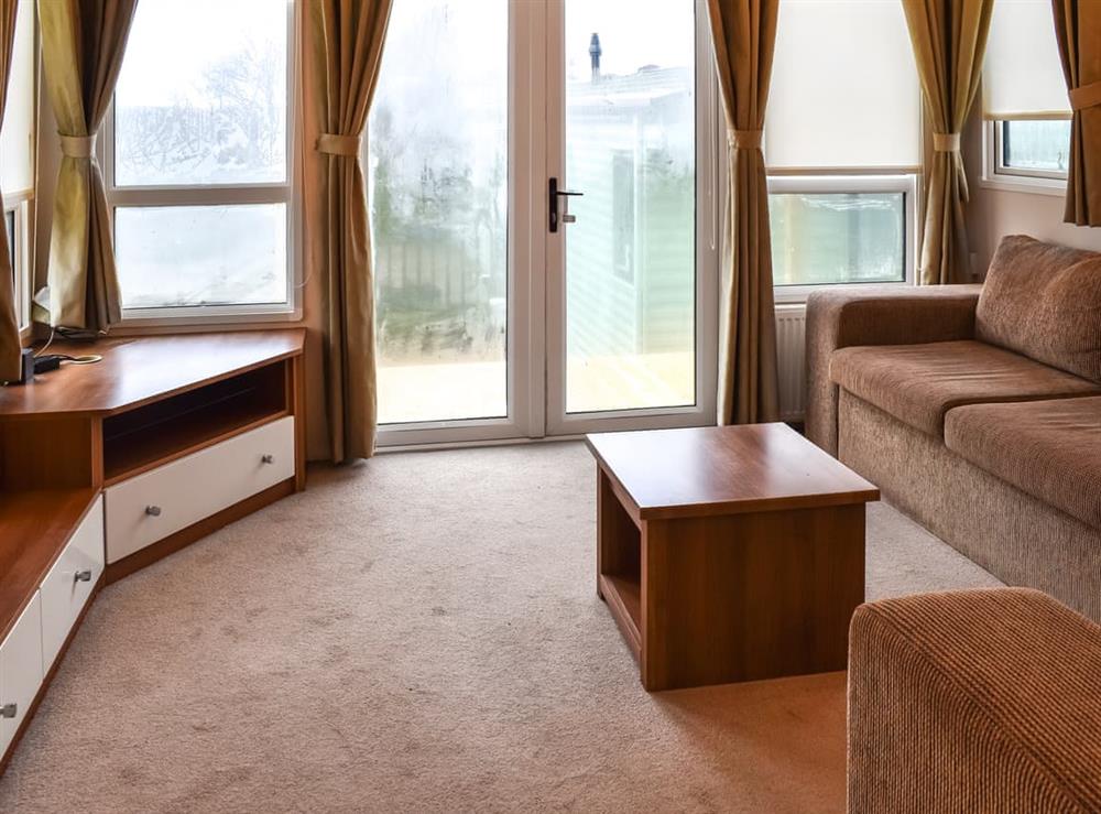 Living area at Inglenook Lodge in Lamplugh, Cumbria