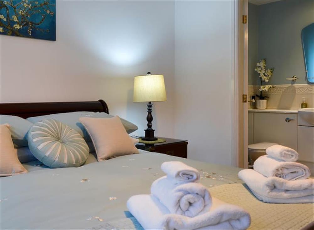 Tranquil bedroom with kingsize bed and en-suite (photo 3) at Inland View in Trearddur Bay, near Holyhead, Anglesey, Gwynedd