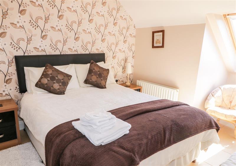 One of the 3 bedrooms at Inverbeg Cottage 1, Downings