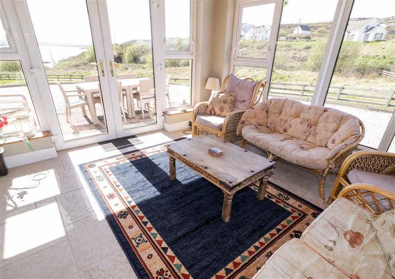 Relax in the living area at Inverbeg Cottage 1, Downings