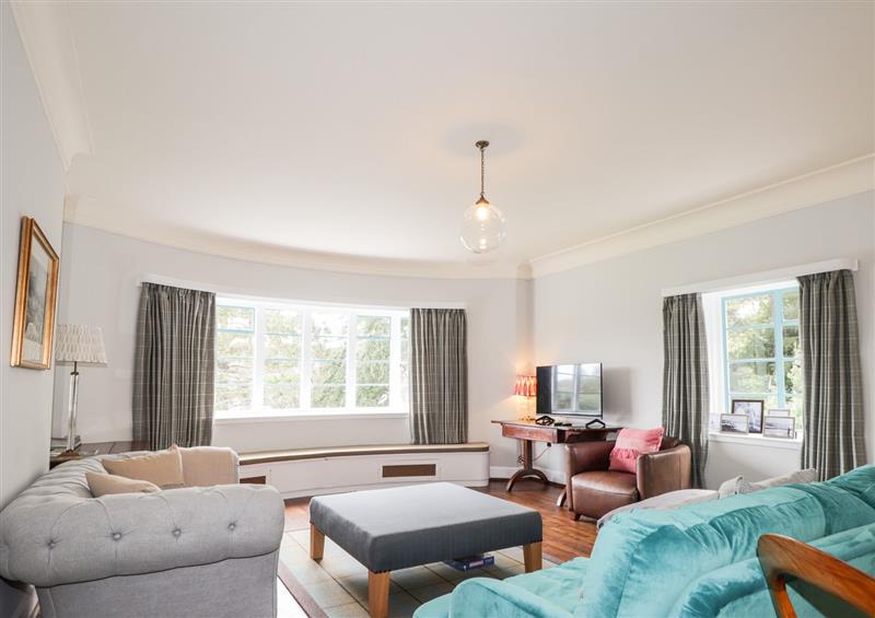 Enjoy the living room at Inverewe House Apartment, Poolewe
