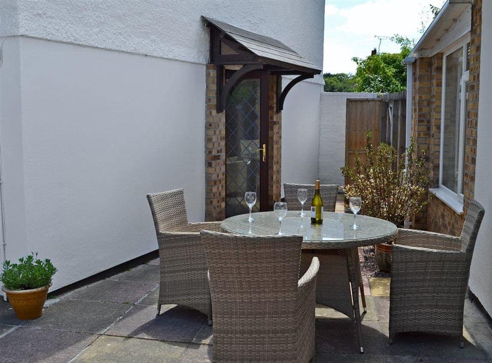 Small courtyard with sitting-out area at Invergarry in Tregrehan, near St Austell, Cornwall