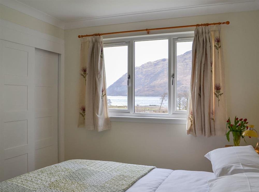 Kingsize double bedroom at Invernoe Cottage in Taynuilt, near Oban, Argyll and Bute, Scotland